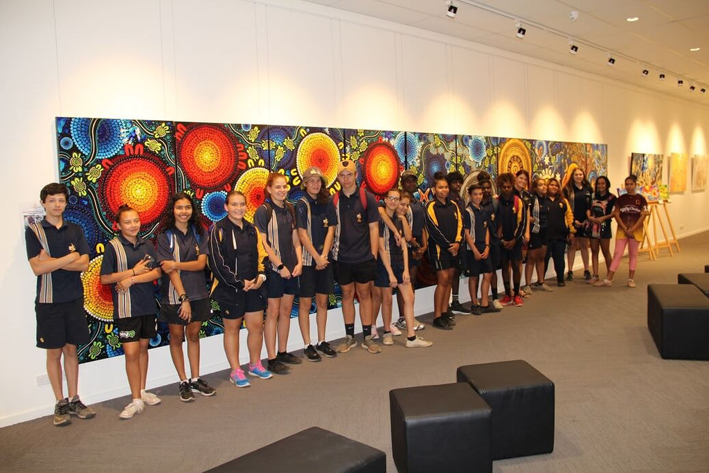 Chern'ee and Brooke hold aboriginal painting workshops with local children