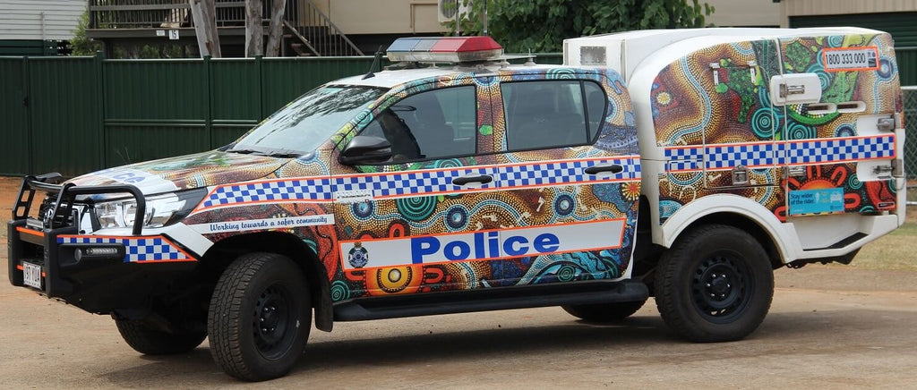 New police cars launched in Woorabinda for Reconciliation Week.