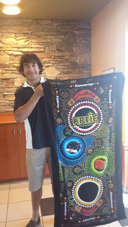 Rugby League Legend Johnathan Thurston displays Chern'ee's Artwork